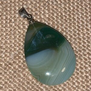 Green stone pendants tear drop